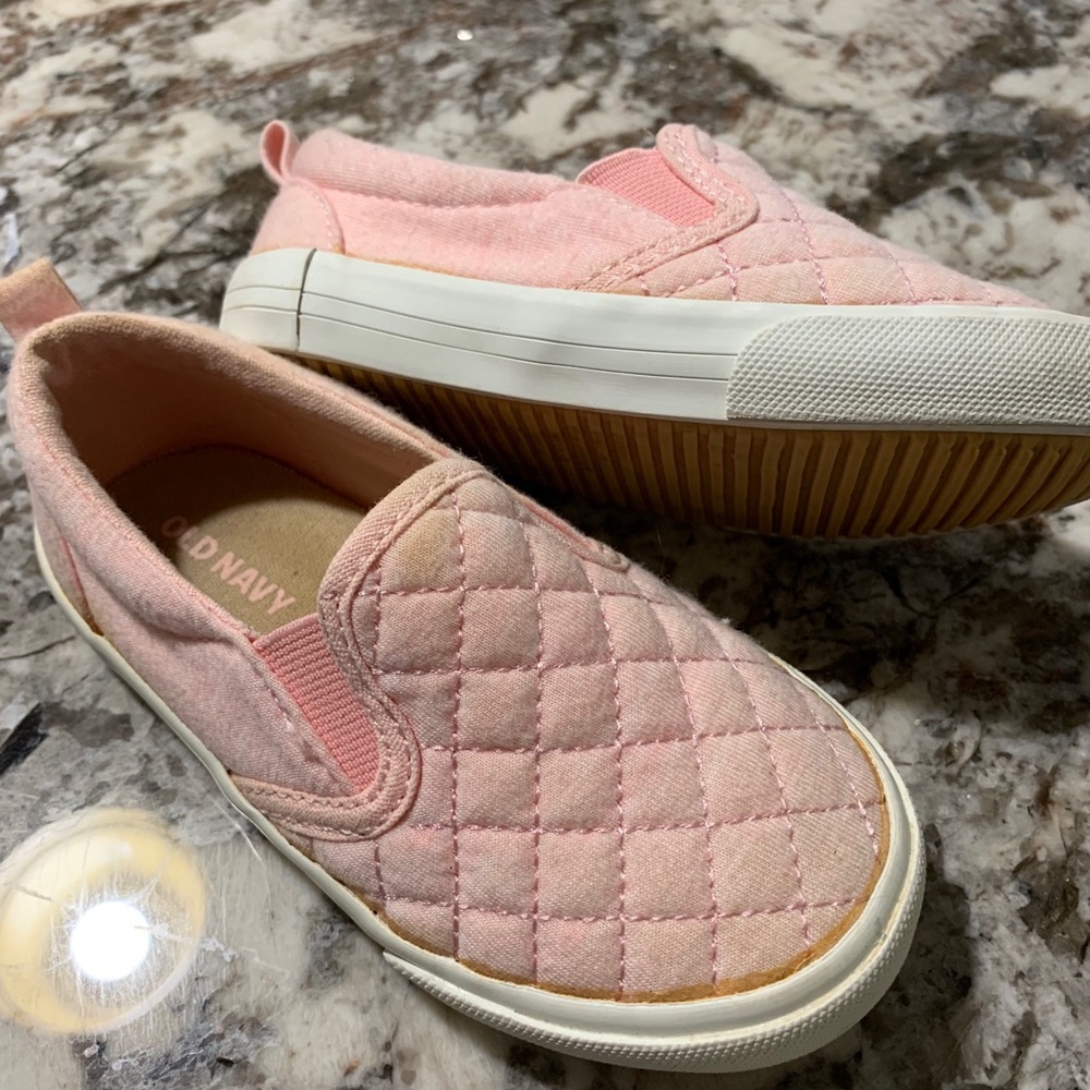 Pink slip on sneakers